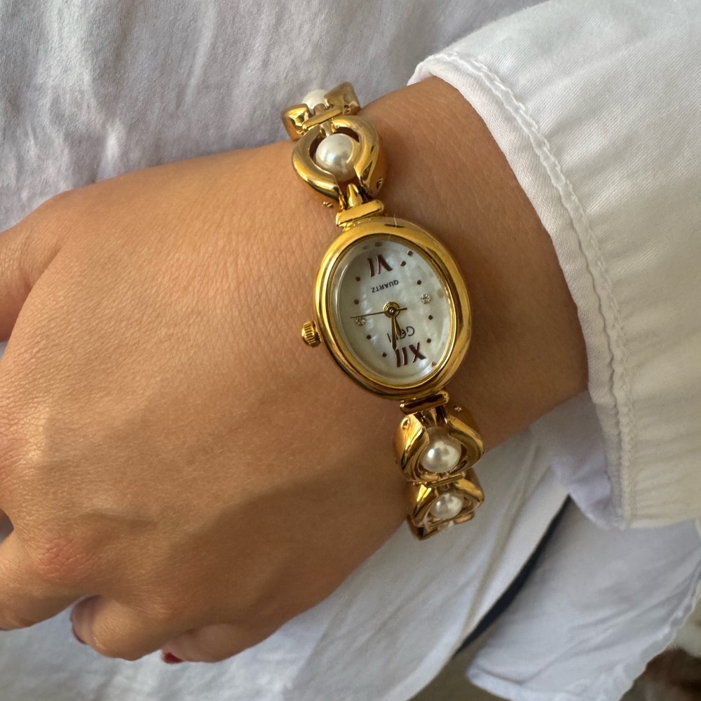 Caducci pearl and gold watch